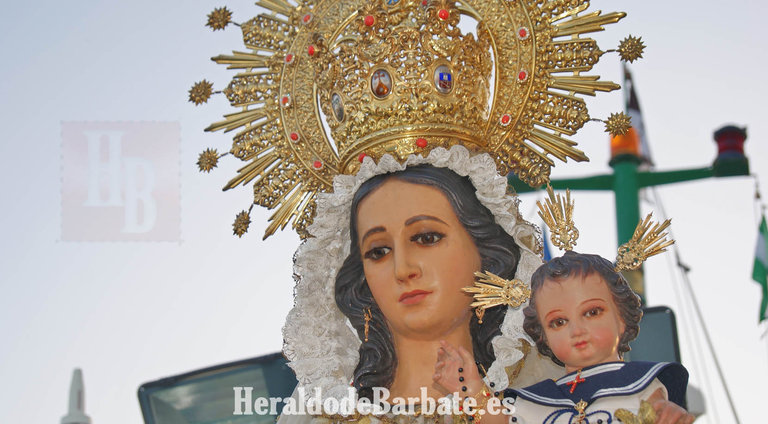 La Virgen del Carmen en su procesión marítima. / Rossi